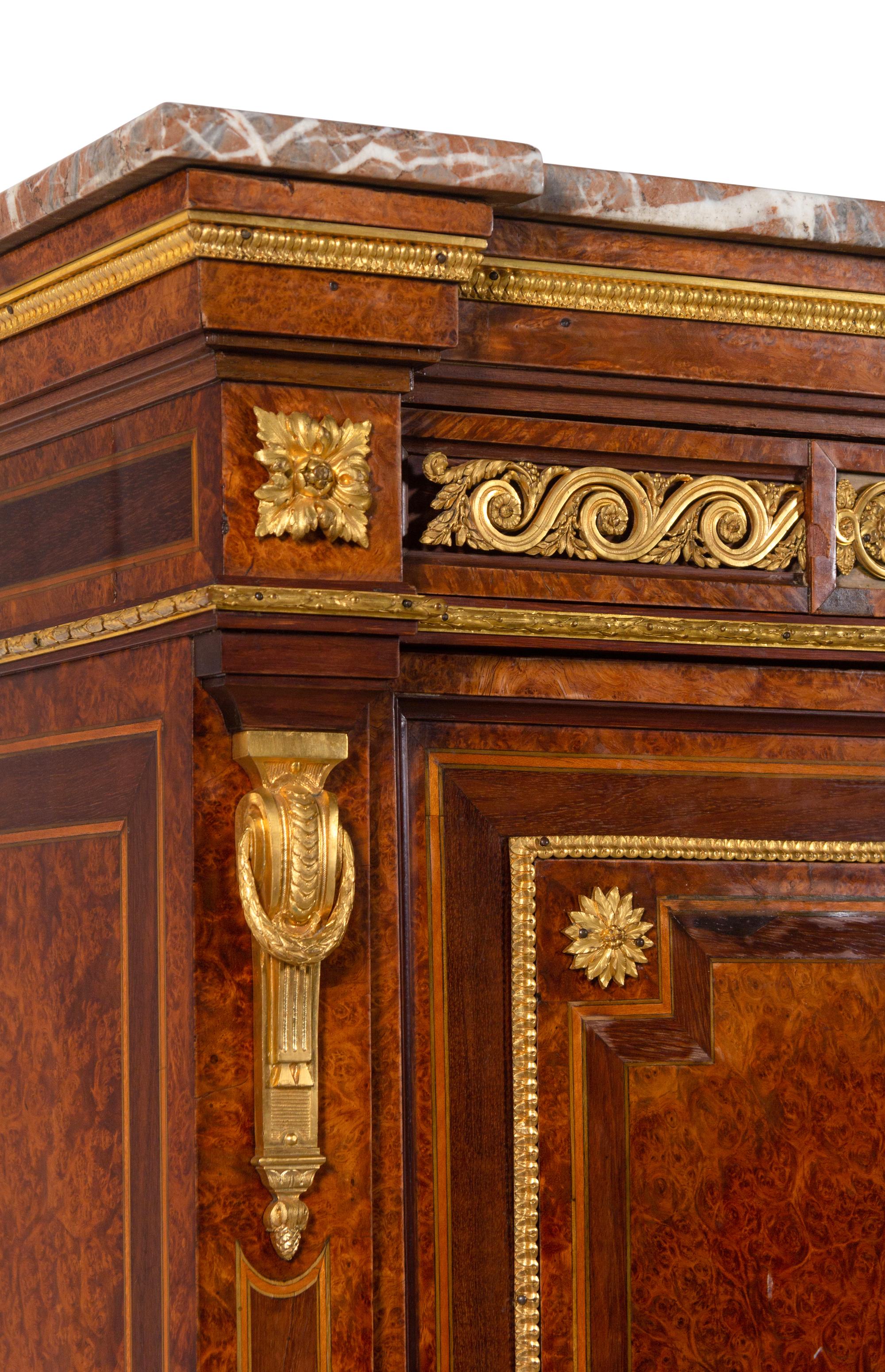 A Louis XVI Style Gilt Bronze Mounted Amboyna Marble-Top Secrétaire à Abattant