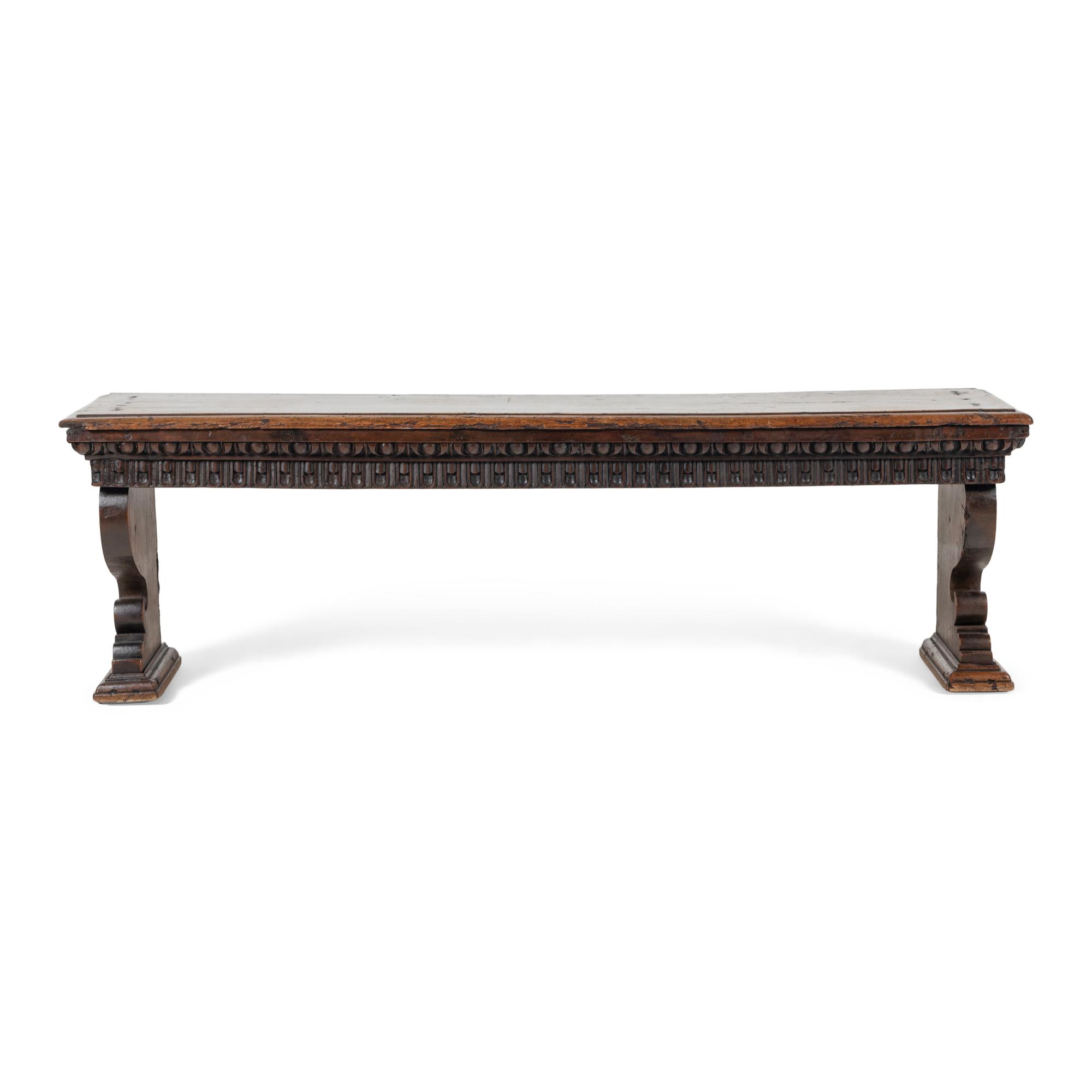 An Italian Renaissance Style Carved Walnut Bench