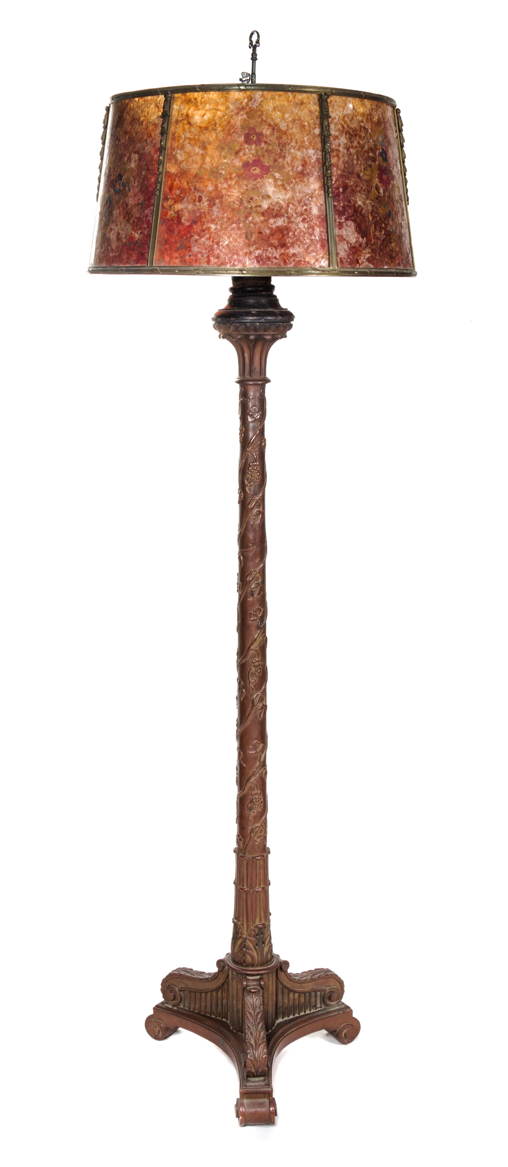 A Continental Carved Floor Lamp Height overall 79 inches.