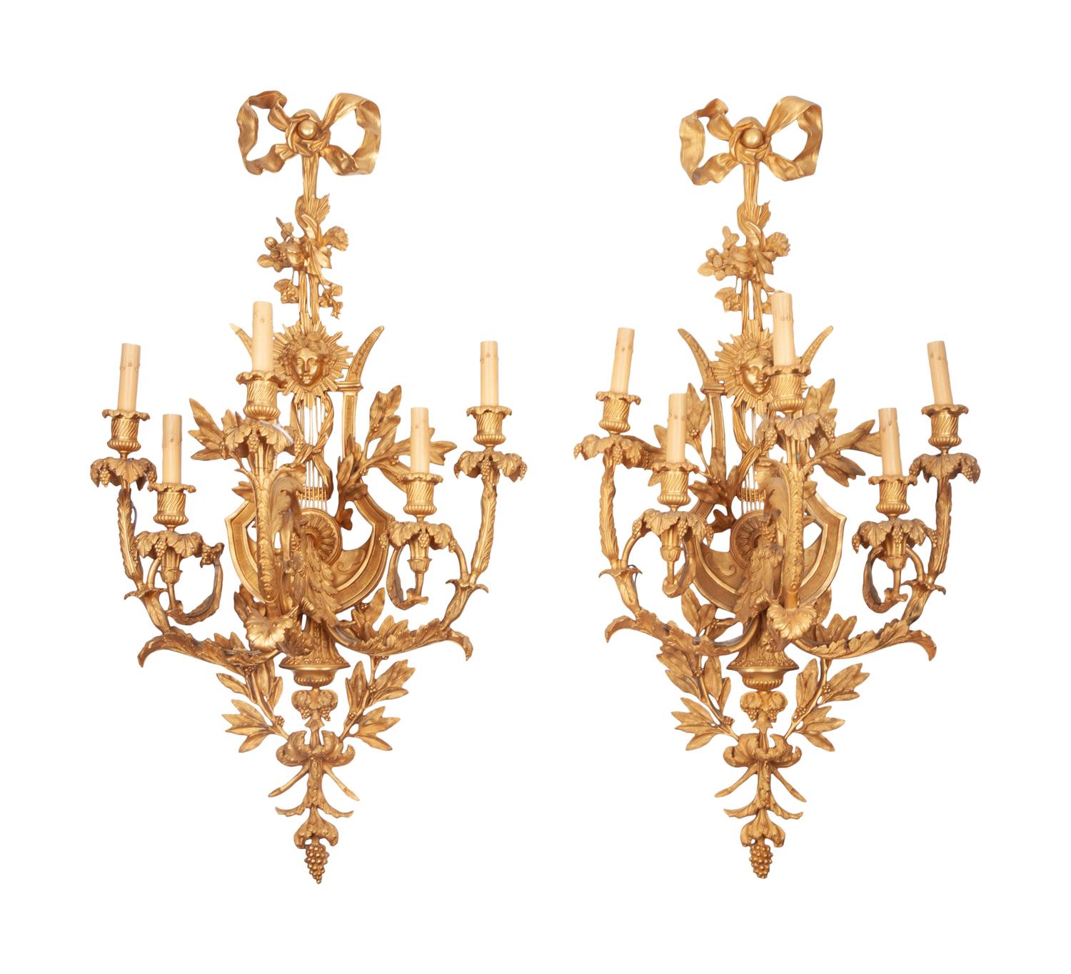 A Set of Four Louis XVI Style Gilt Bronze Five-Light Scones
