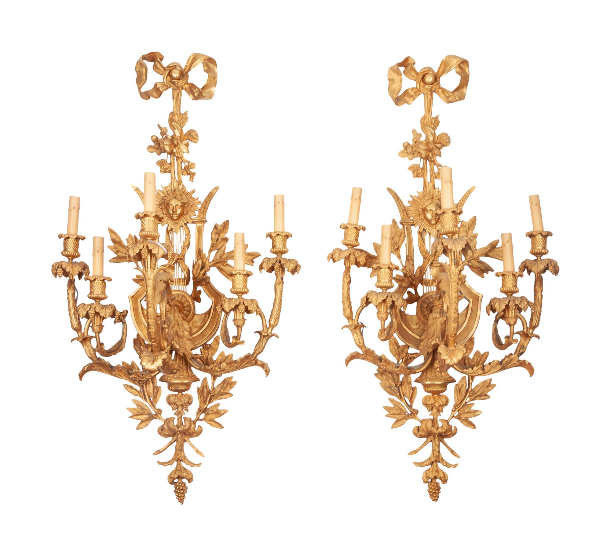 A Set of Four Louis XVI Style Gilt Bronze Five-Light Scones
