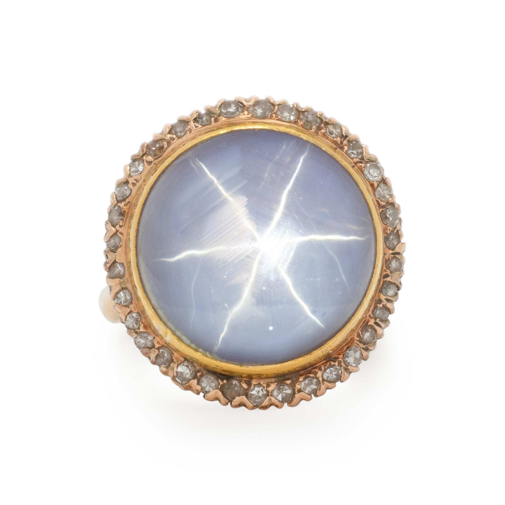 YELLOW GOLD, STAR SAPPHIRE, AND DIAMOND RING