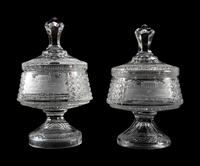 A Near Pair of Cut and Etched Glass Commemorative Covered Urns
