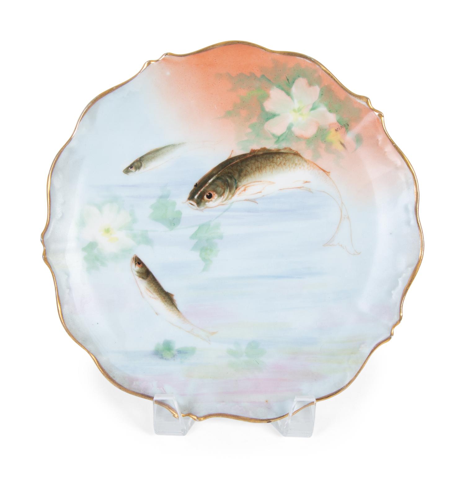 A Limoges Hand Painted Porcelain Fish Service — 19TH/20TH CENTURY