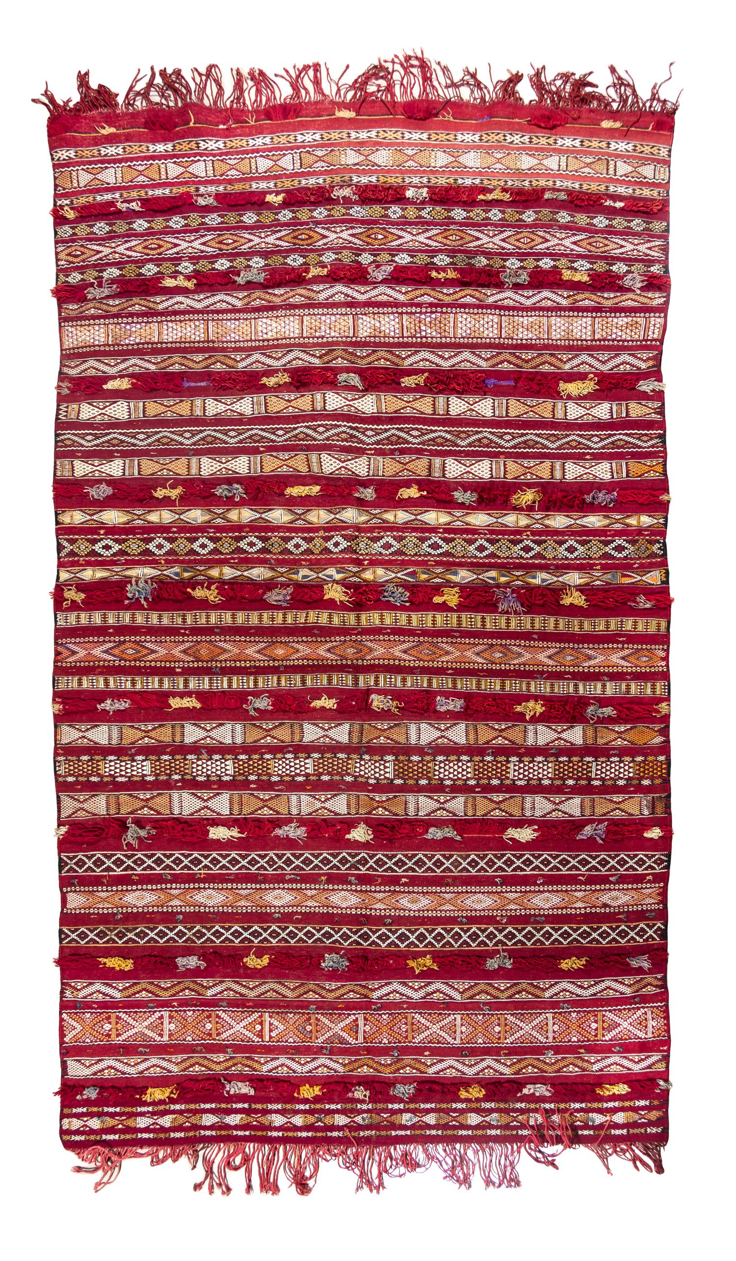 A Moroccan Wool Rug 8 feet 6 inches x 4 feet 9 inches.