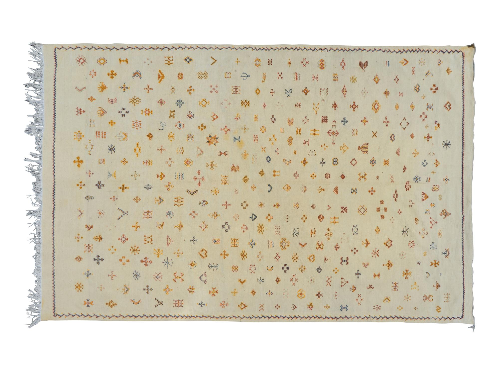 A Needlepoint Area Rug — 20TH CENTURY