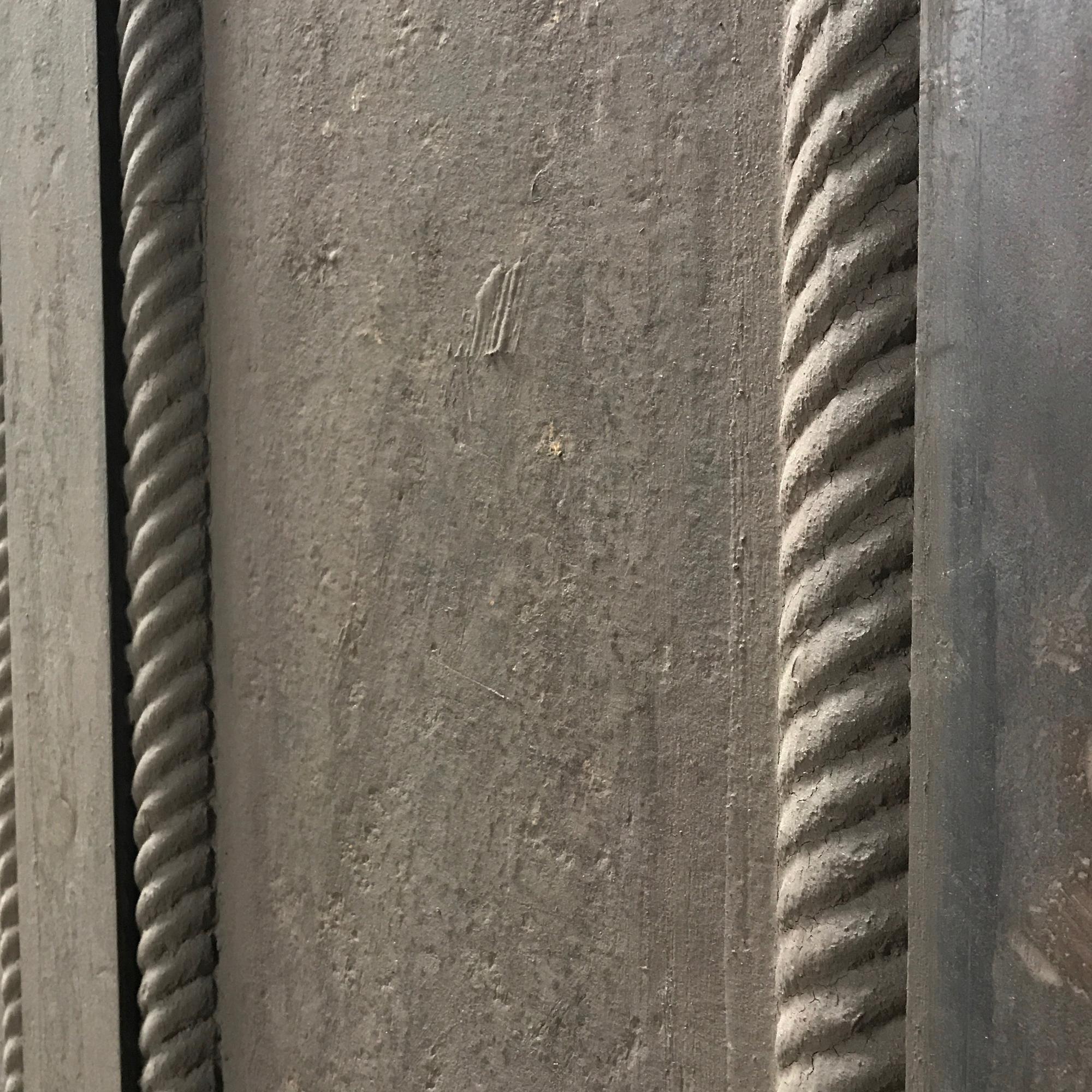 A Cast Iron Safe Door with Frame and Combination 36" W x 4" D x 84" H — United States, 20th Century