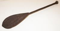 A Carved Wood Oar Length 37 1/4 inches.