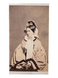 [EARLY PHOTOGRAPHY]. FREDRICKS, C.D., photographer. A group of 2 CDVs of actress Emma Webb, incl. image taken with young African American subject. New York, n.d.