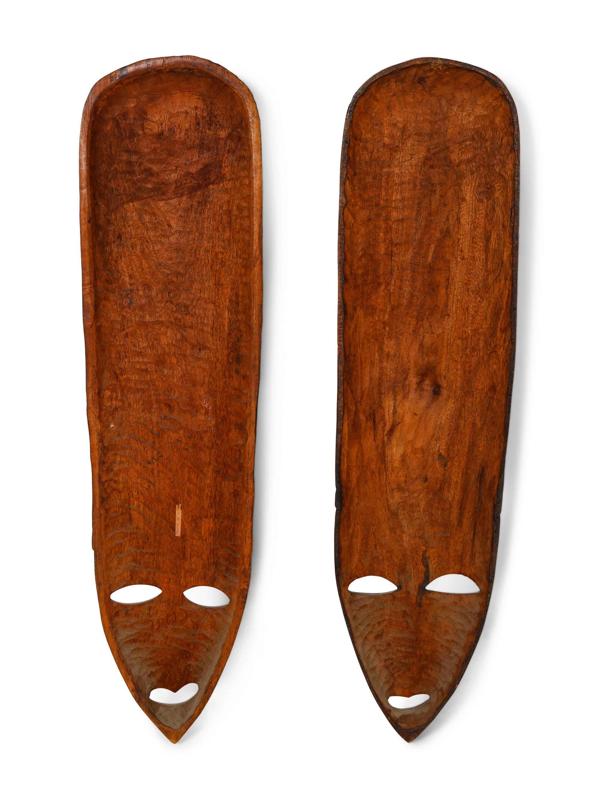 A Pair of African Carved Wood Masks