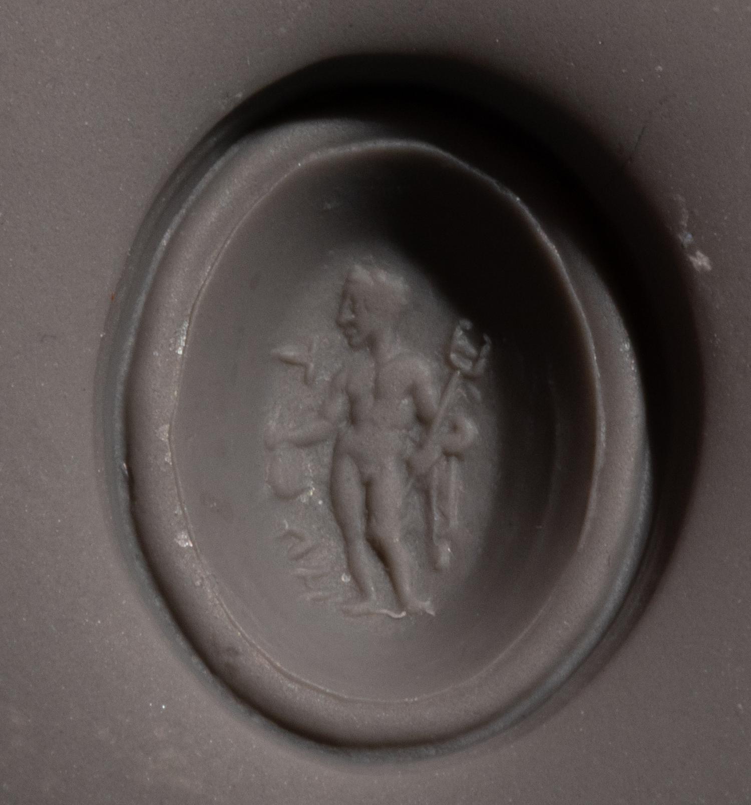 A Roman Banded-Agate Ring Stone with the God Mercury — Set in a gold ring