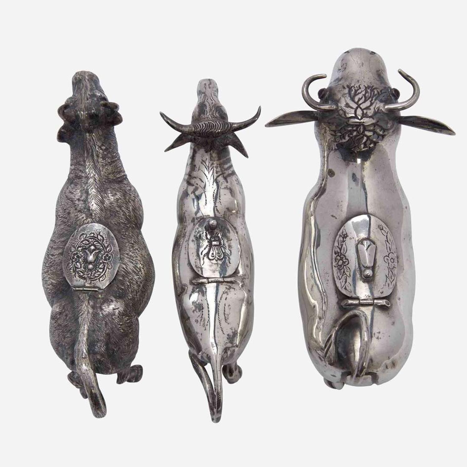 A group of three Continental silver cow creamers 19th / early 20th century