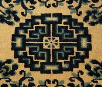 A Group of Four Chinese Rugs
