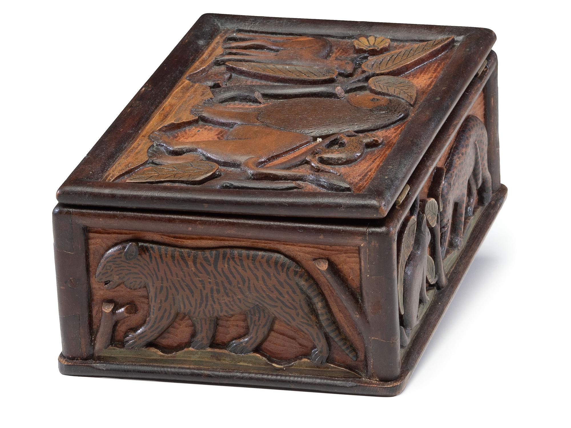 A Folk Art Polychrome Painted Pine Dresser Box with Exotic Animals