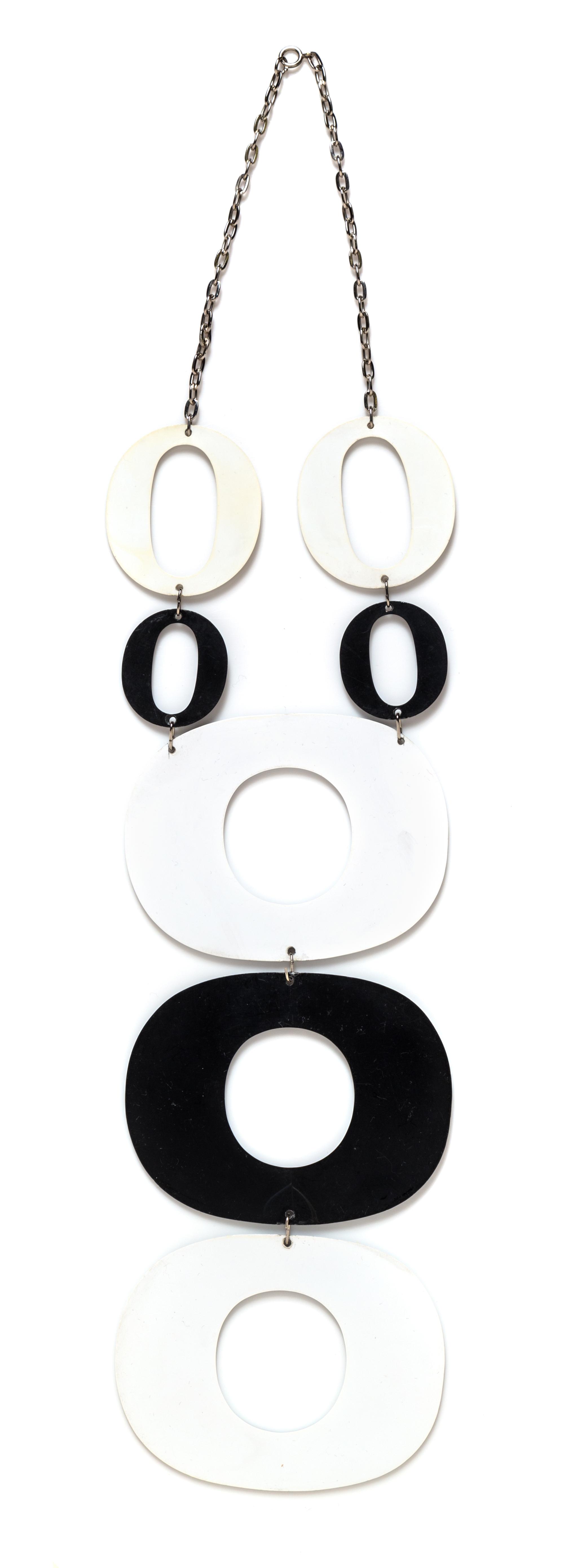 A Couregges Runway Black and White Bib Necklace, Necklace: 18"; Pendant: 10".
