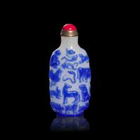 A Chinese Blue Overlay Snowflake Ground Glass "Zodiac" Snuff Bottle