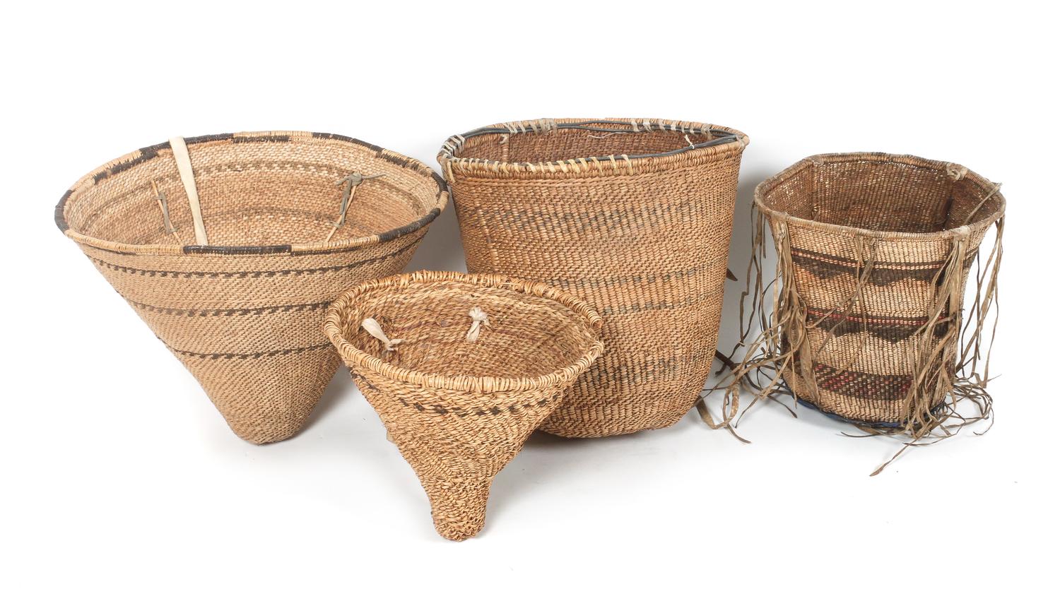 Seven Apache Gathering Baskets Height of largest 16 x diameter 16 1/2 inches.