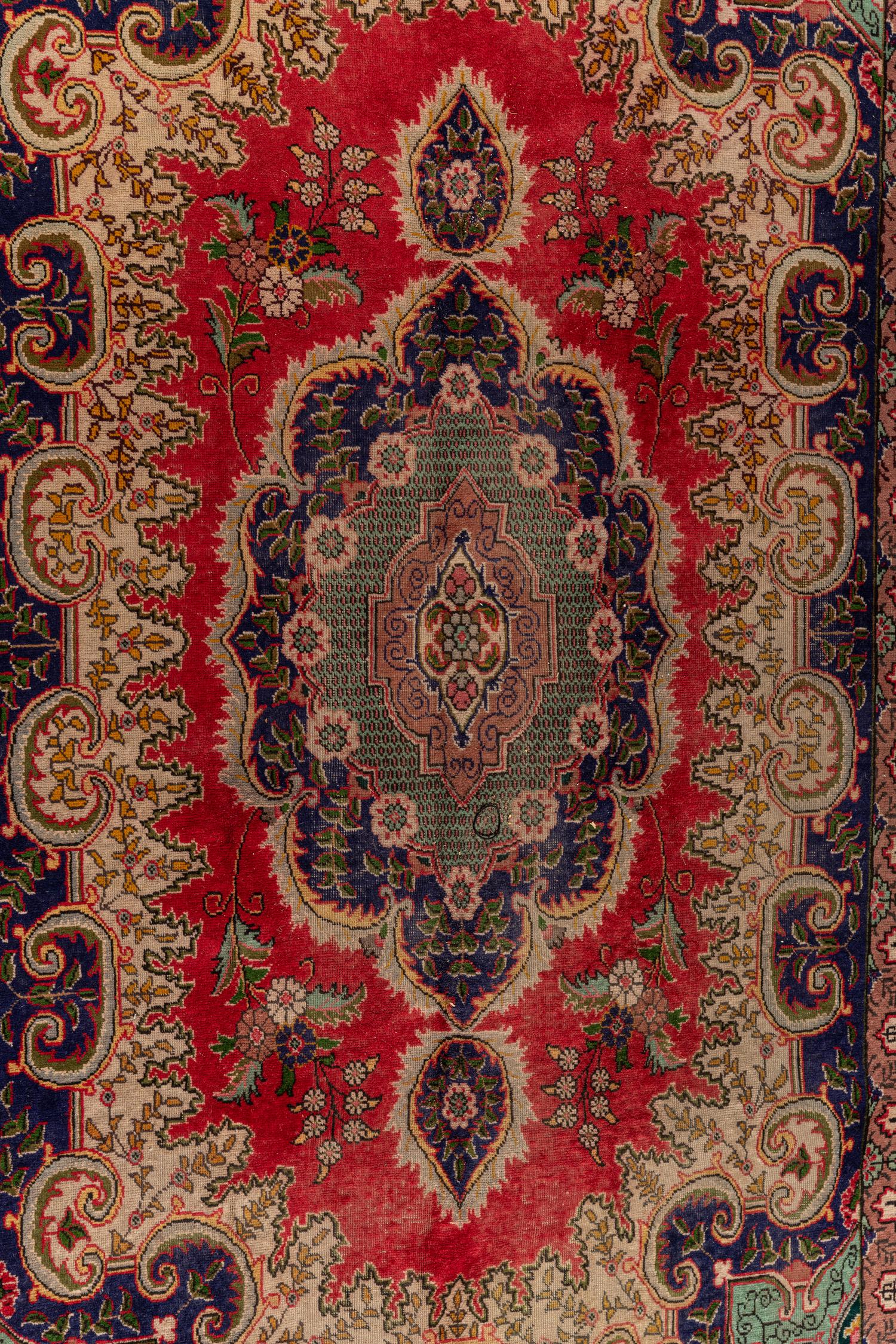 A Tabriz Wool Rug