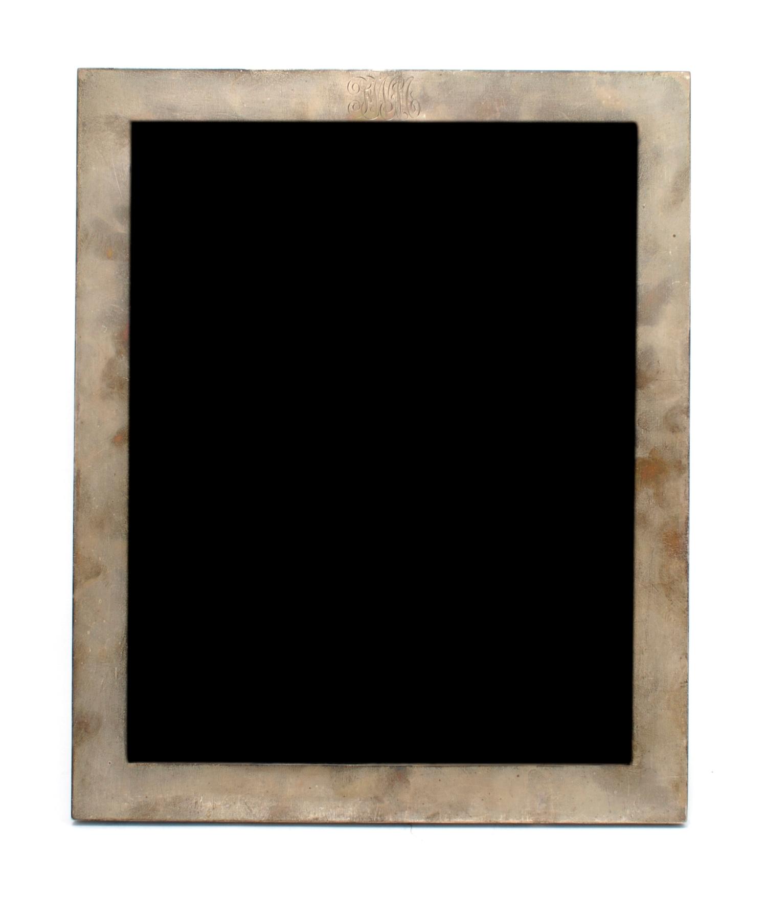 An American Sterling Silver Framed Mirror, Height 16 1/2 inches.