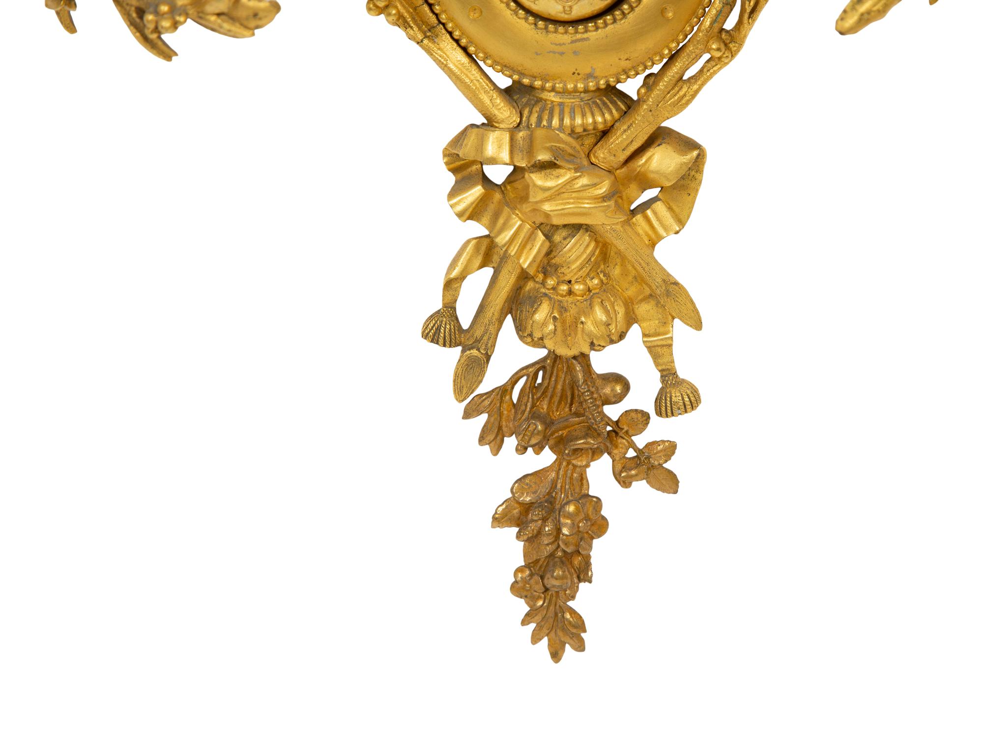 A Pair of French Gilt Bronze Lyre-Form Four-Light Sconces