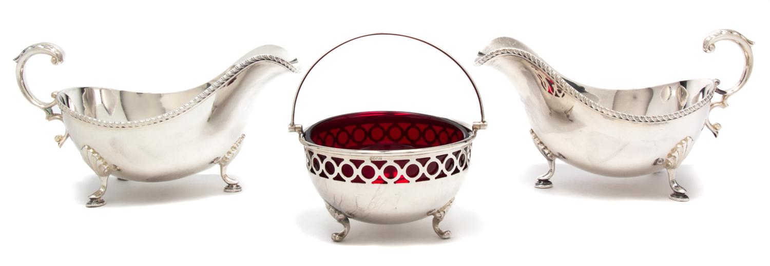 A Group of Three Silver-Plate Articles Length of longest 7 1/2 inches.