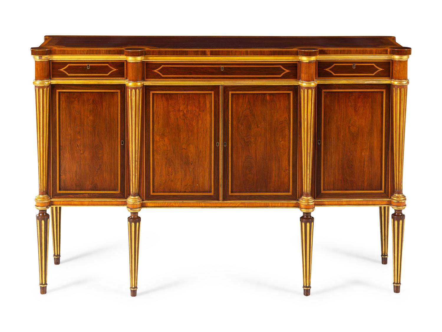 A Russian Neoclassical Parcel Gilt Cabinet