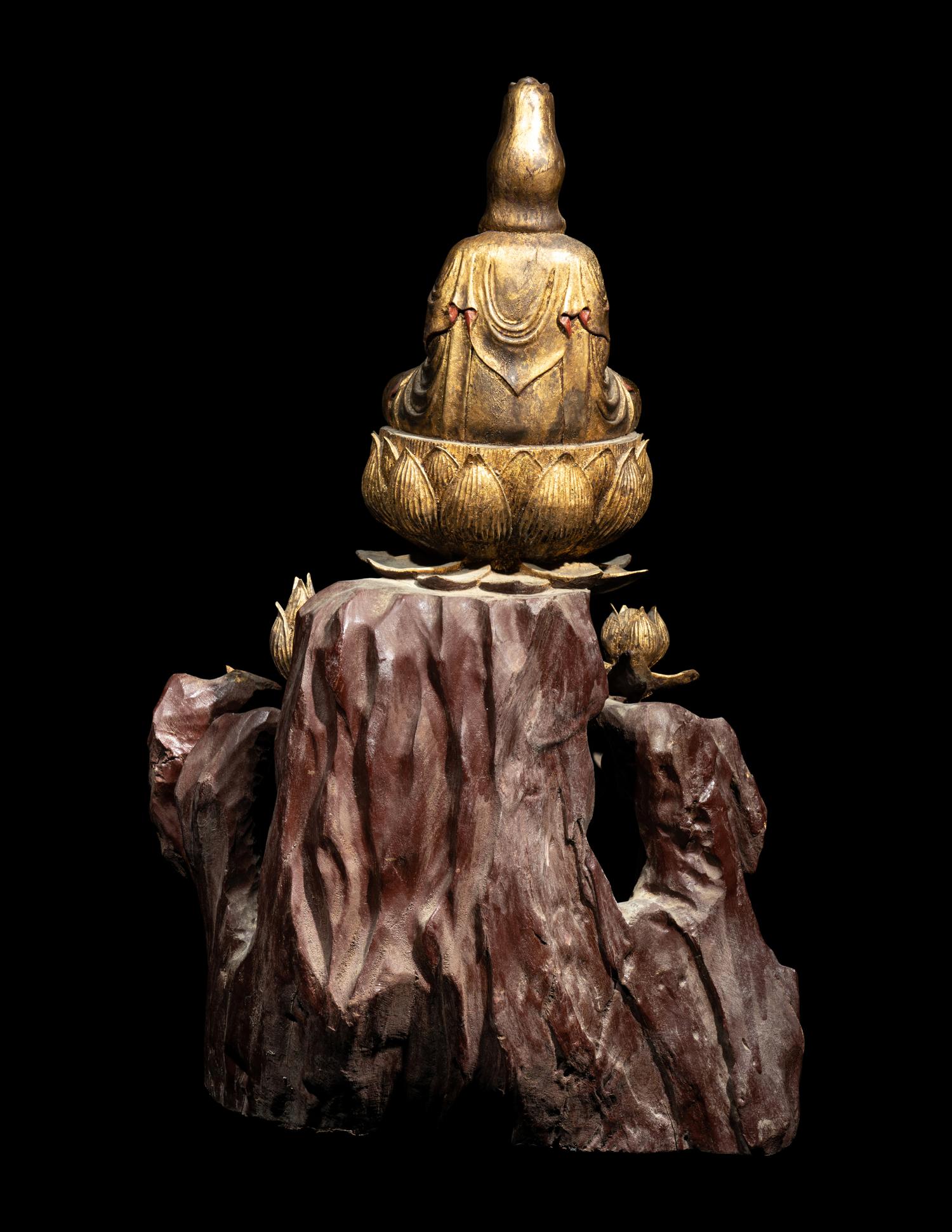 A Chinese Red and Gilt Lacquered Wood Figure of Guanyin