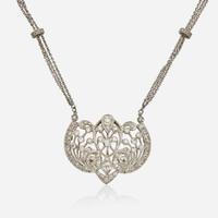 An Edwardian Platinum and Diamond Pendant on Chain