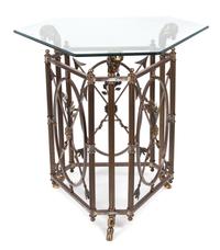 A Neoclassical Style Silvered and Gilt Metal Glass Top Table Height 38 3/4 x width 40 1/2 x depth 35 1/4 inches. — 20TH CENTURY
