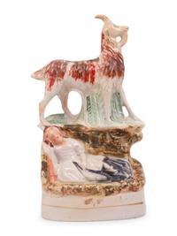 A Group of Eight Staffordshire Pottery Figures