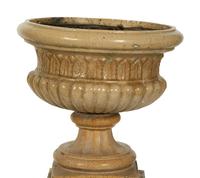 A Pair of Continental Ceramic Urns on Pedestals — EARLY 20TH CENTURY