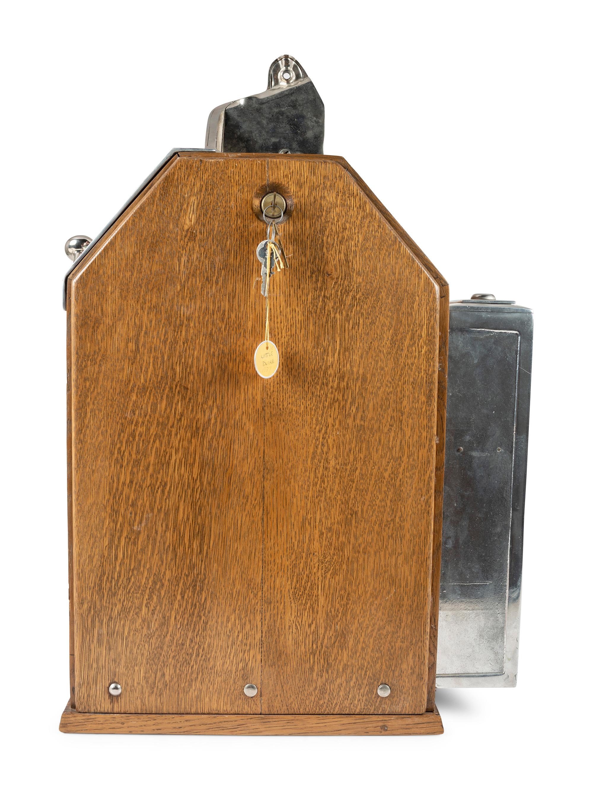 A Jennings One Cent Little Duke Gum Dispensing Slot Machine