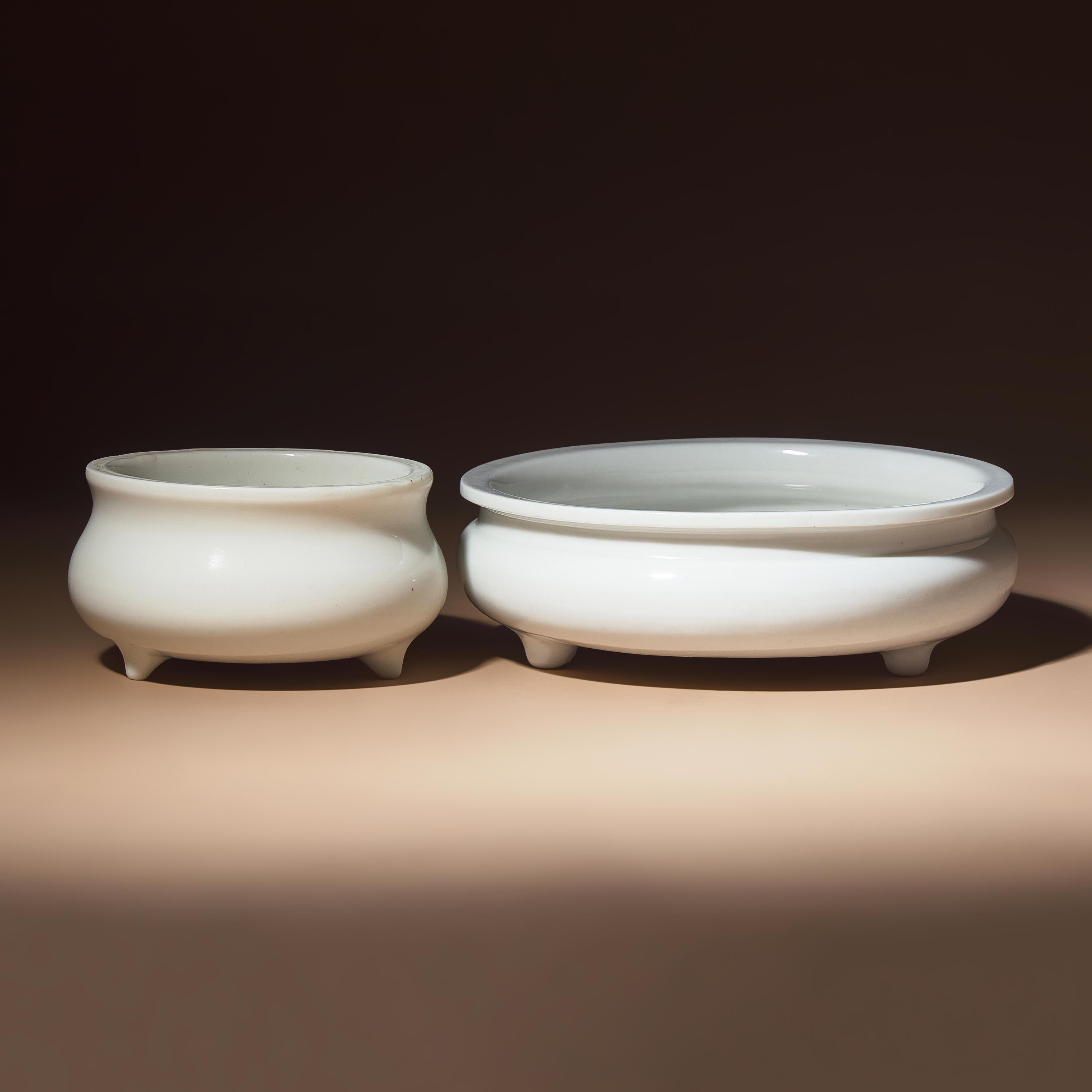 Two Chinese Blanc-de-Chine Porcelain Tripod Censers, Early Qing Dynasty — 清早期 德化白瓷三足爐兩具