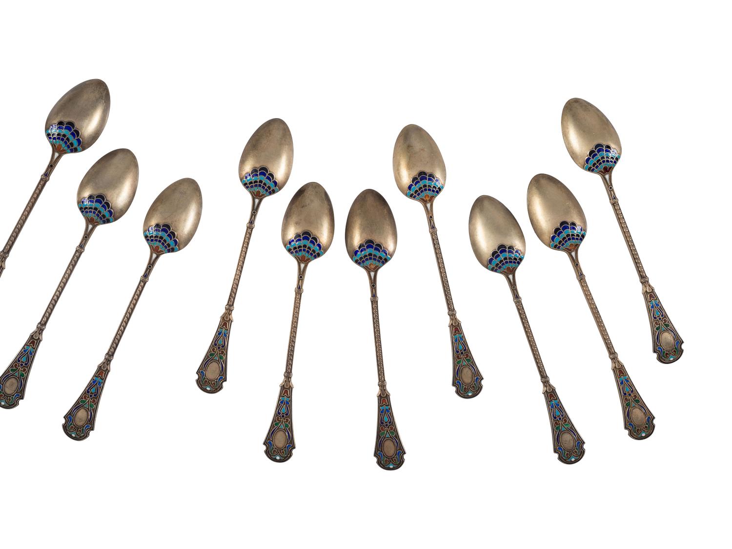 Thirty Russian Silver and Enamel Spoons and Forks
