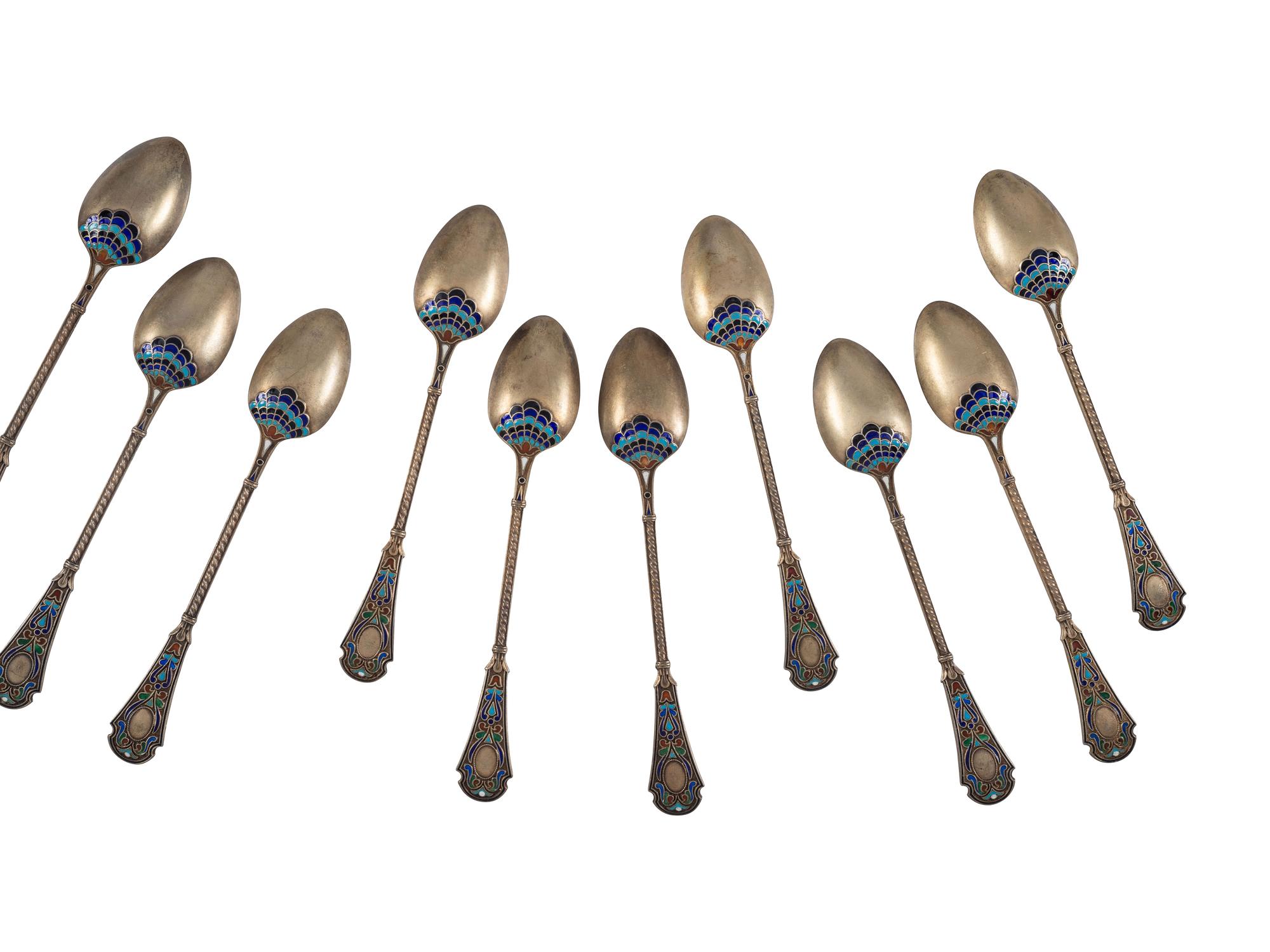 Thirty Russian Silver and Enamel Spoons and Forks