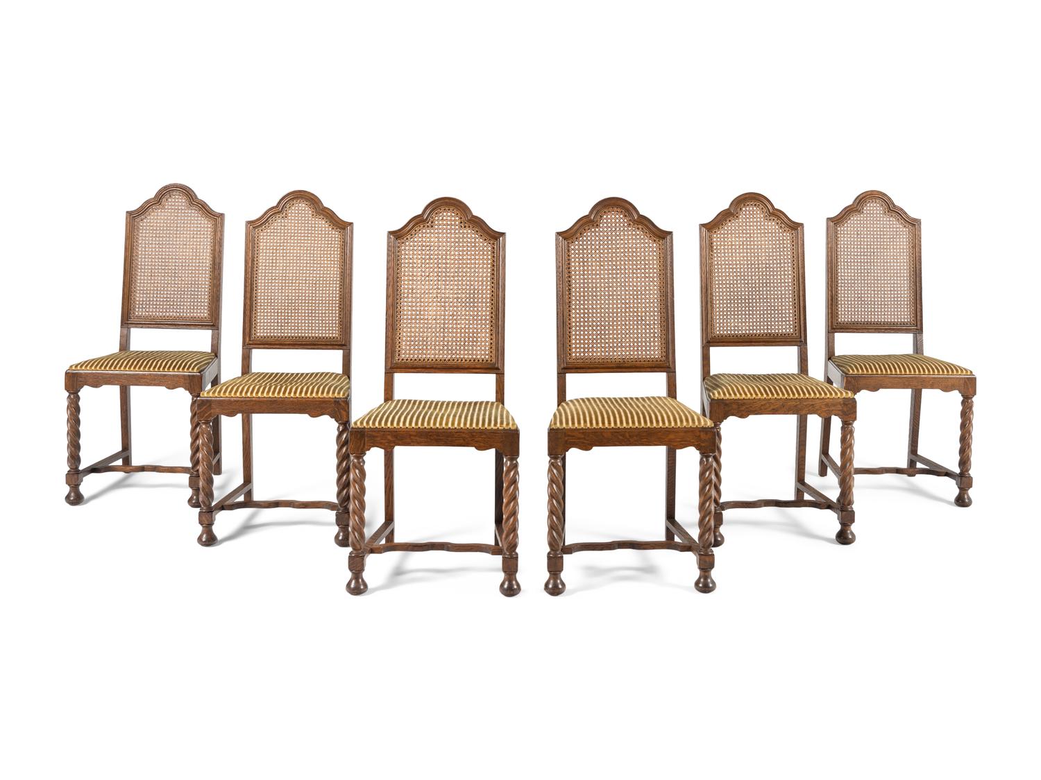 A Set of Eight William and Mary Style Oak Dining Chairs