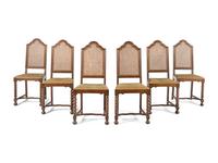 A Set of Eight William and Mary Style Oak Dining Chairs