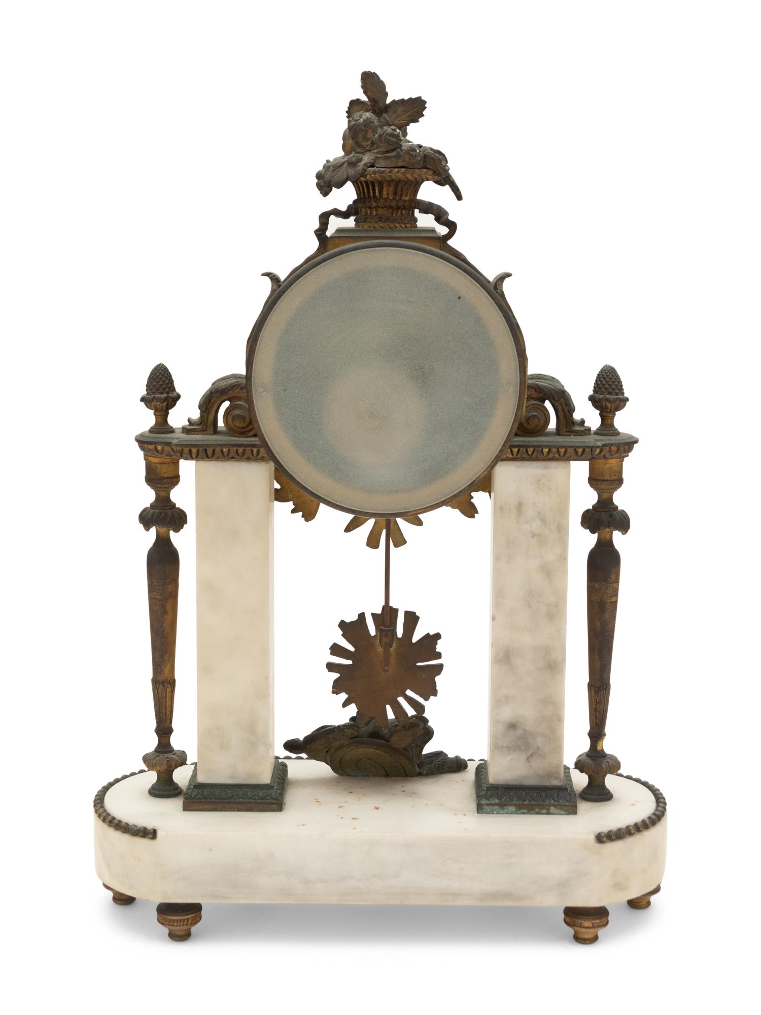 A French Gilt Bronze and Marble Mantel Clock