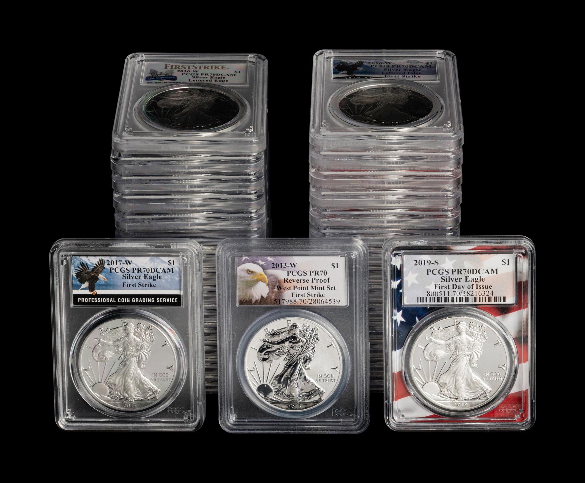 A Group of Thirty-One PCGS Graded PR70 DCAM and PR70 Reverse Proof Silver Eagle $1 Coins