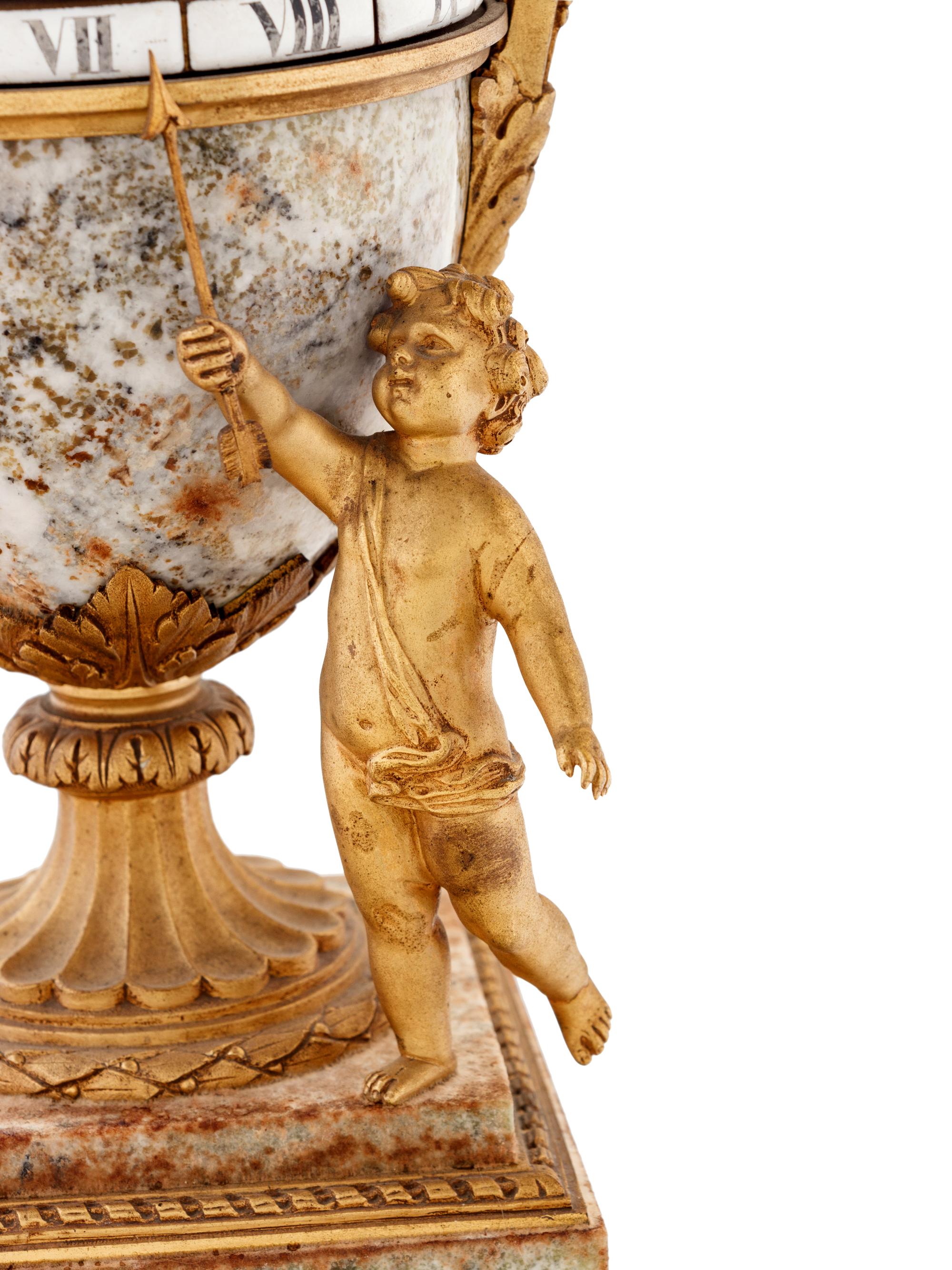 A Louis XVI Style Gilt Bronze and Marble Annular Clock