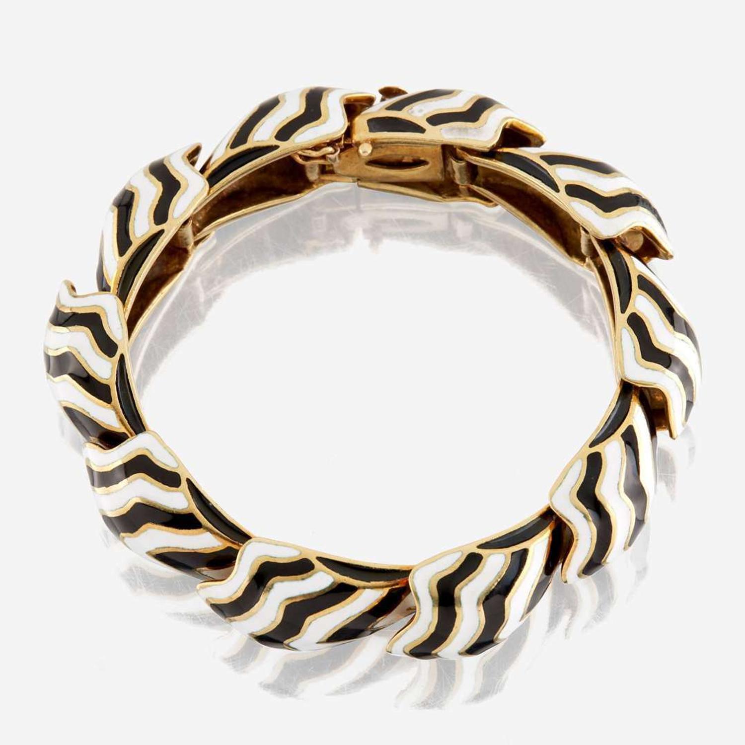 A gold and enamel bracelet
