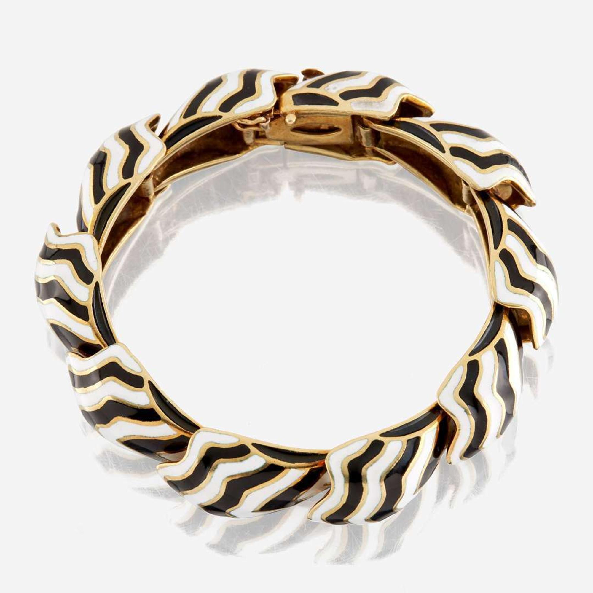 A gold and enamel bracelet