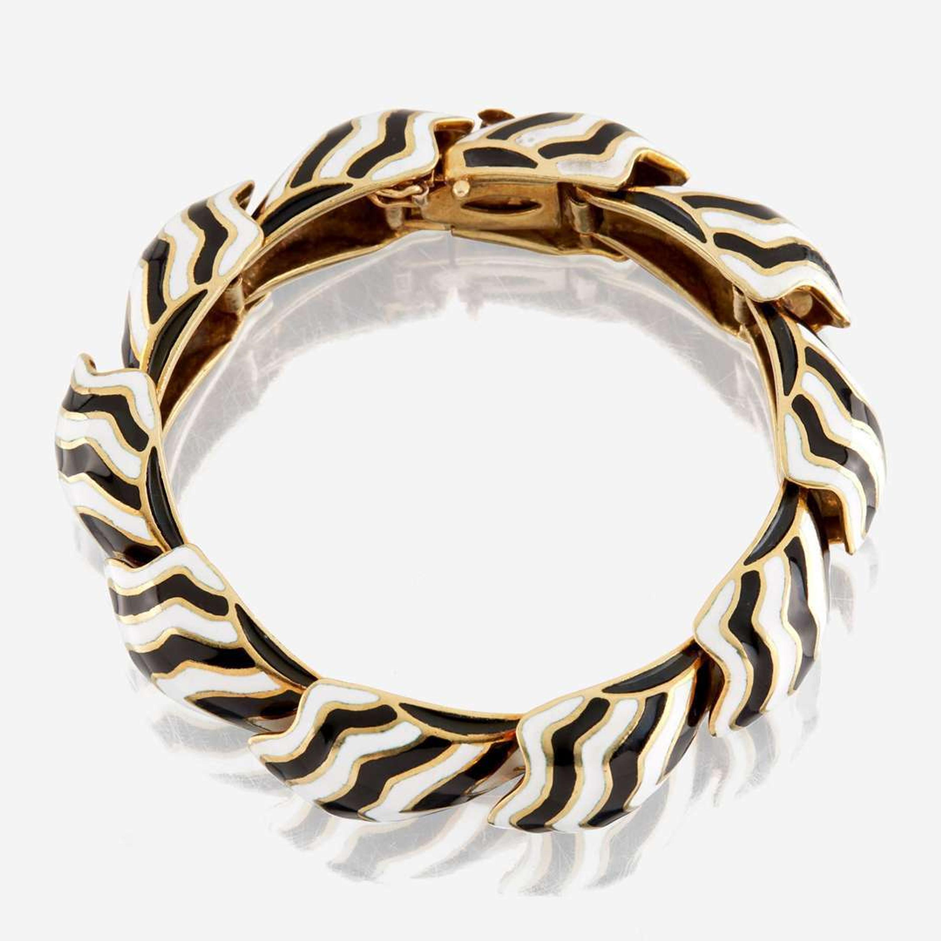 A gold and enamel bracelet