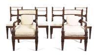 A Set of Twelve Regency Mahogany Dining Chairs, Height 37 inches.
