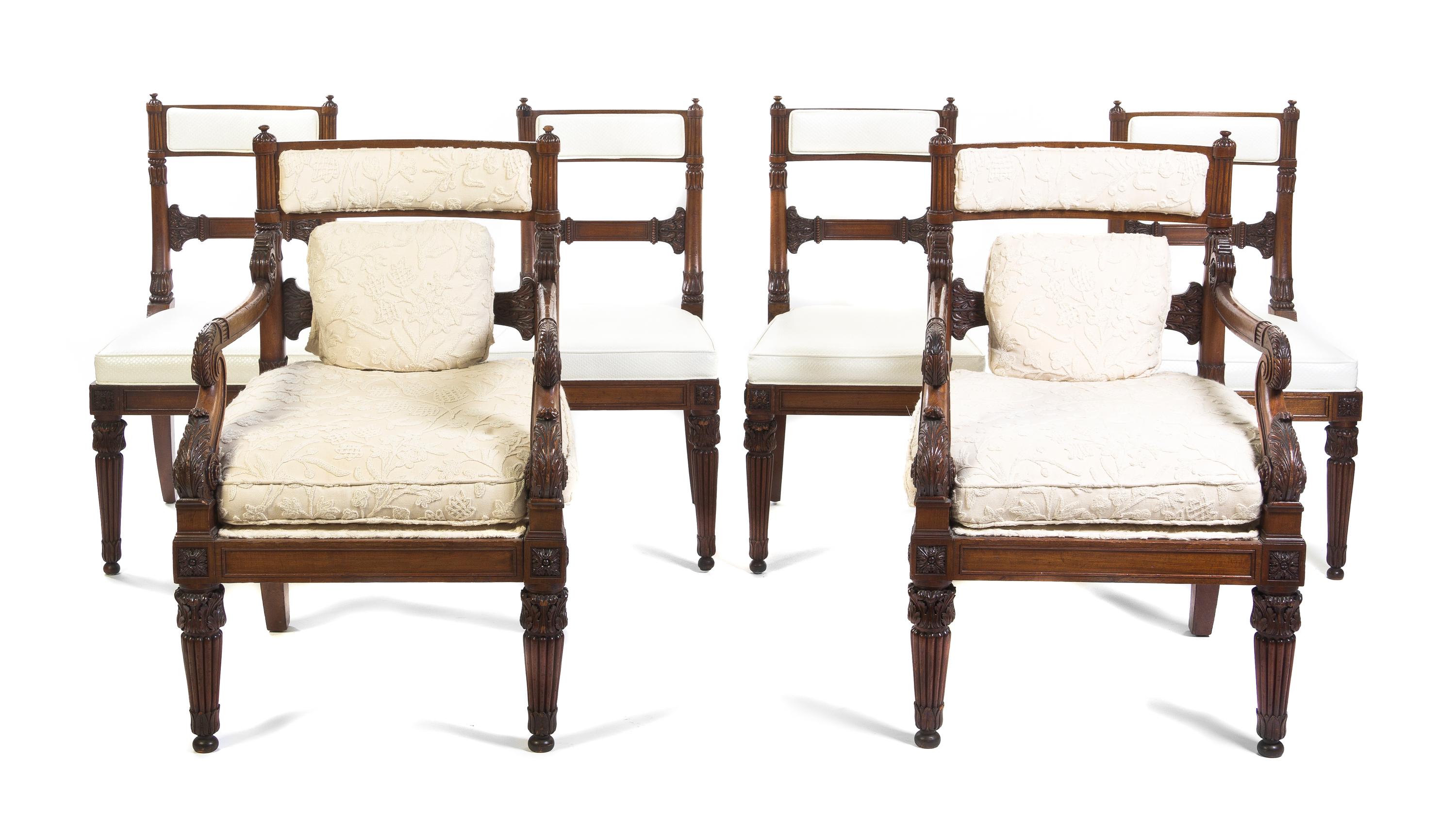 A Set of Twelve Regency Mahogany Dining Chairs, Height 37 inches.