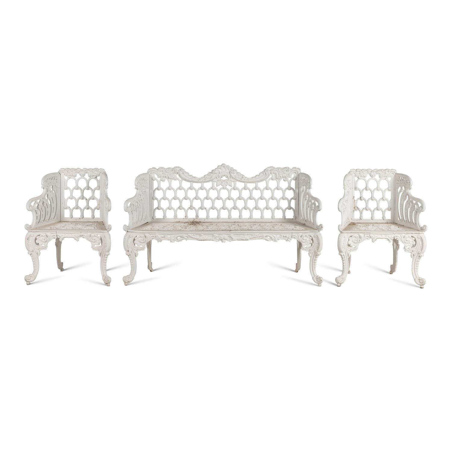 A White-Painted Cast Iron Three-Piece Garden Seating Suite