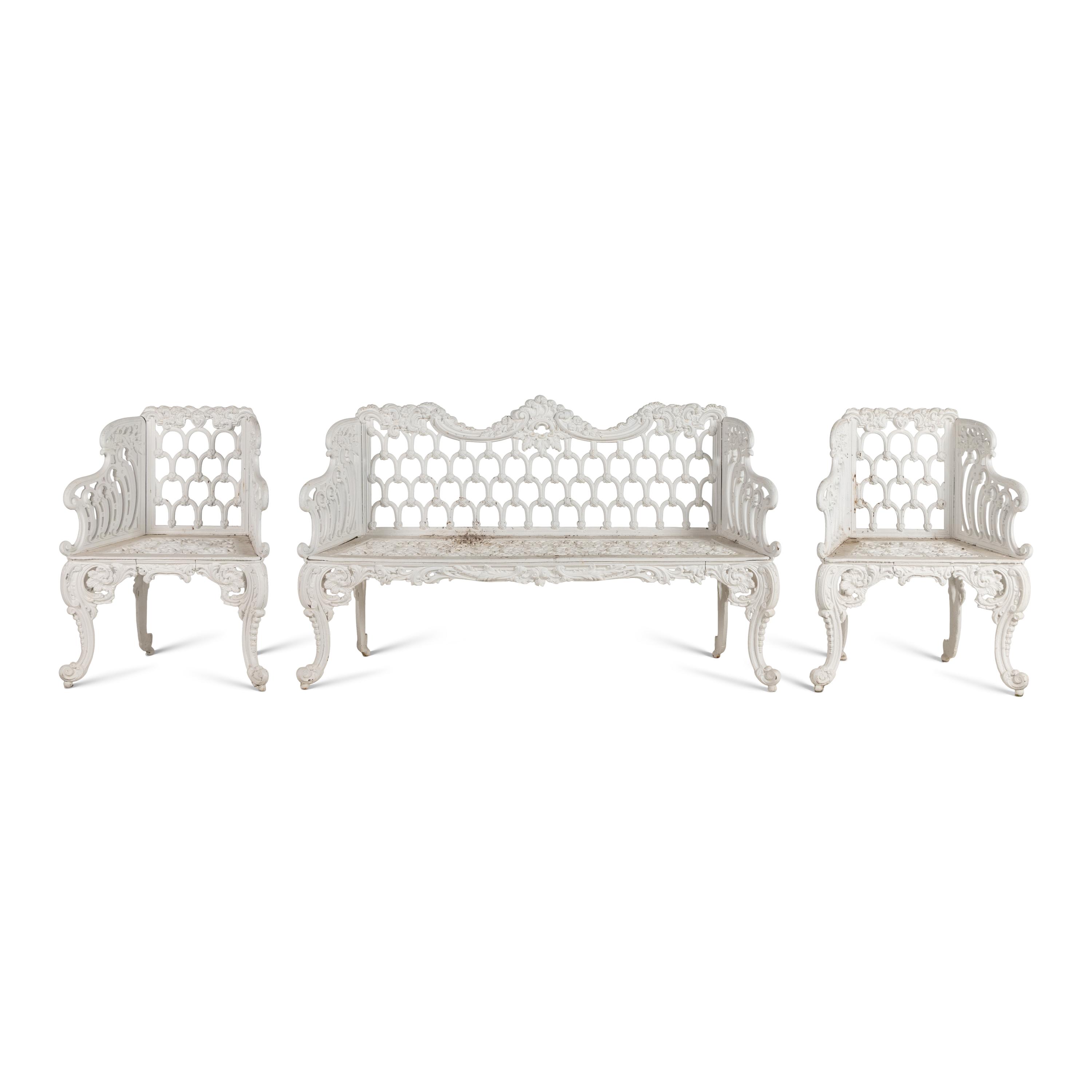 A White-Painted Cast Iron Three-Piece Garden Seating Suite