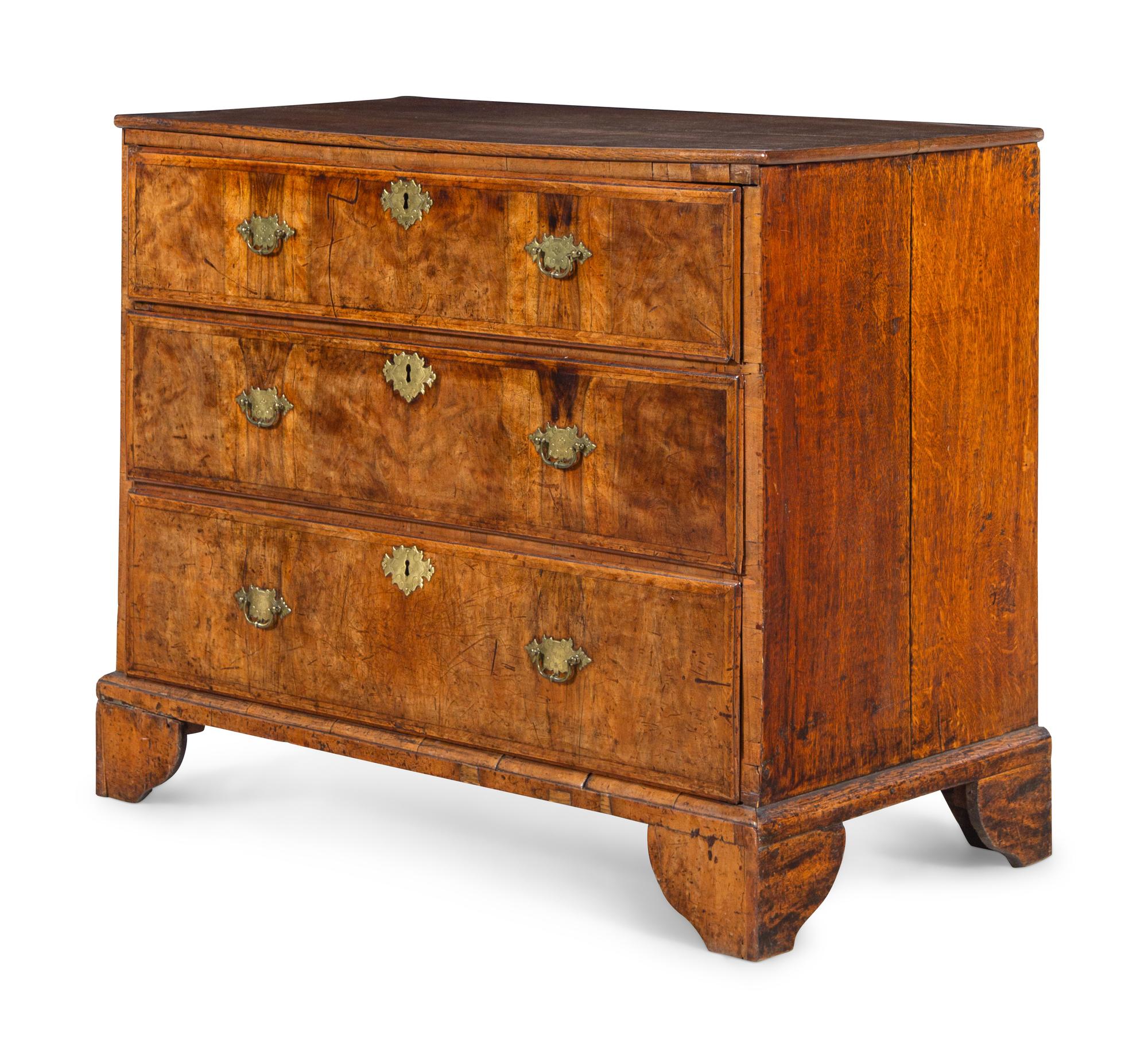 A George III Walnut and Oak Chest of Drawers