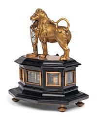 A German Gilt Brass Quarter-Striking Automaton Clock with Lion