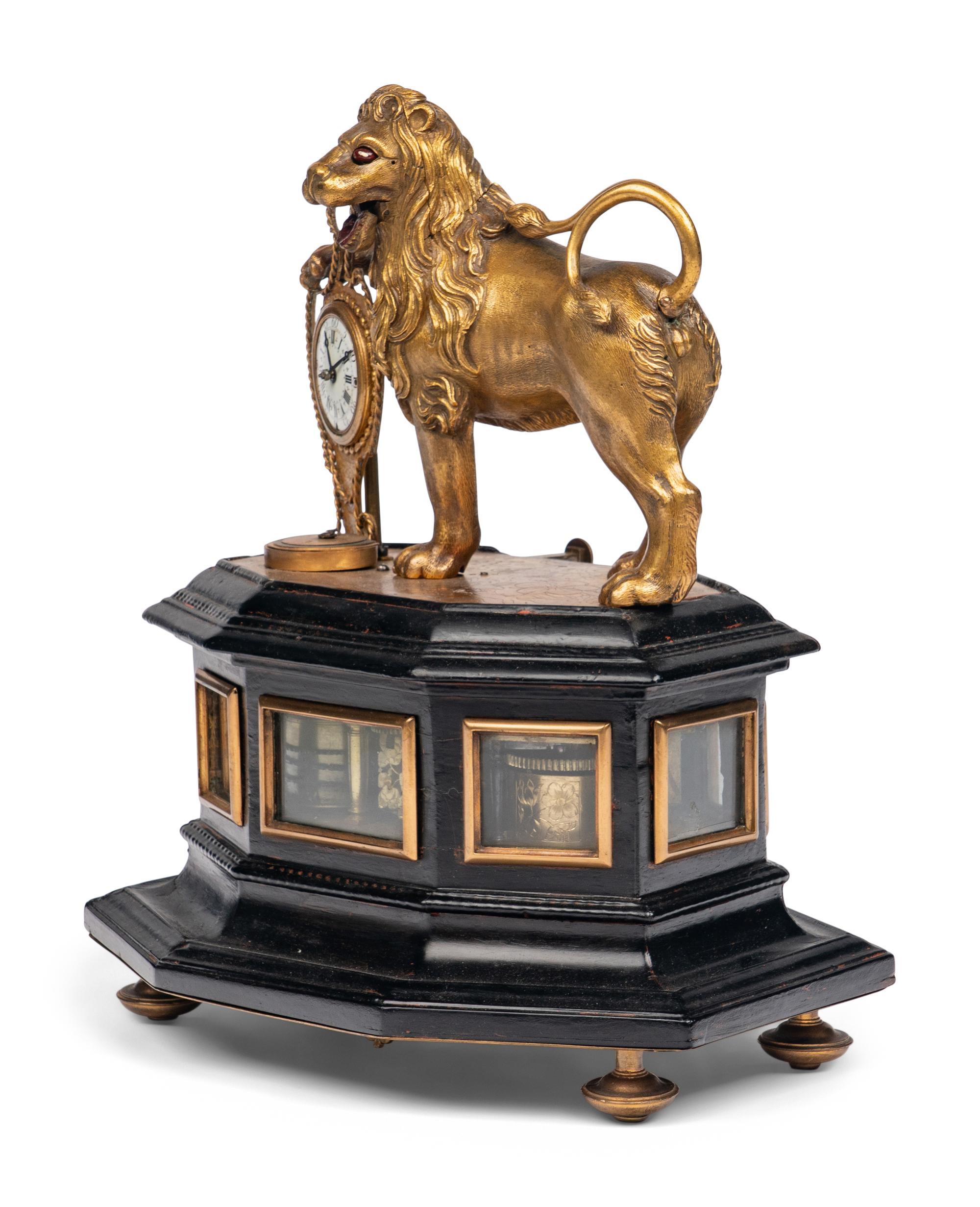A German Gilt Brass Quarter-Striking Automaton Clock with Lion